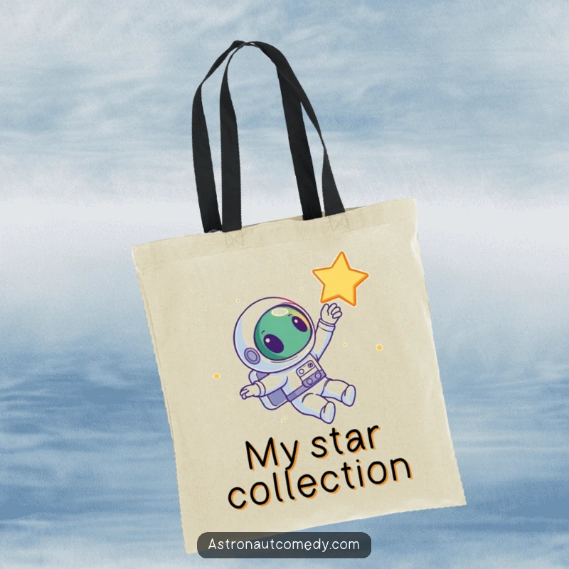 Funny tote bag with a curious alien astronaut floating in space, happily extending an arm to reach for a bright, distant star.